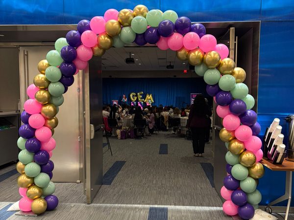 Corporate event stage balloon decor